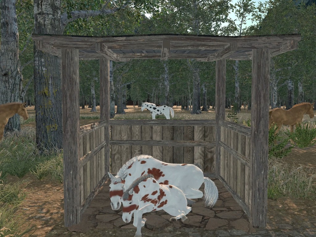 Real gameplay screenshot: spotted mare and foal resting in a rustic wooden field shelter
